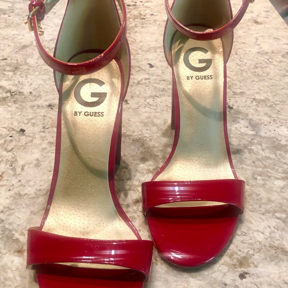 Red high heel shoes by Guess